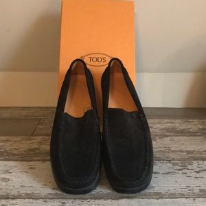 Todd’s black suede loafers